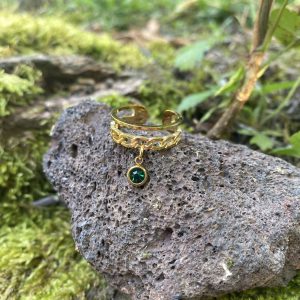 Bague maille ajustable doré et strass vert